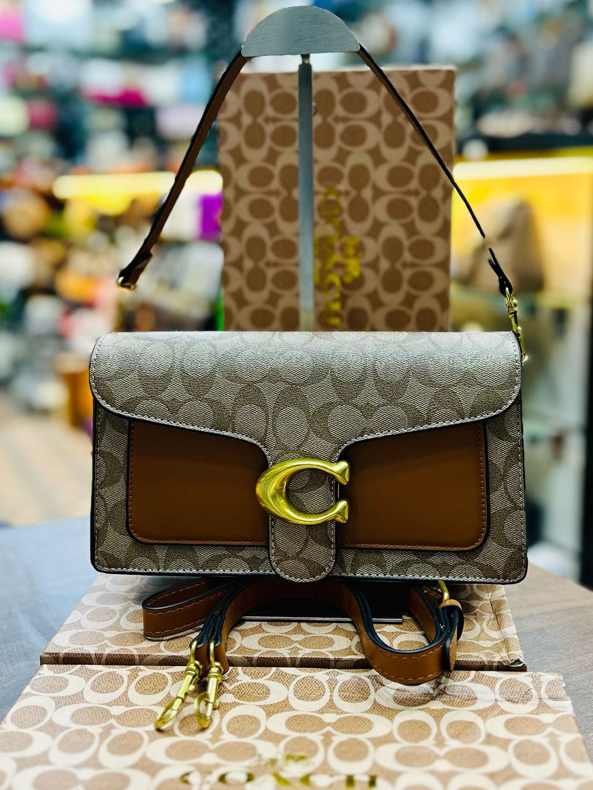 coach tabby clutches