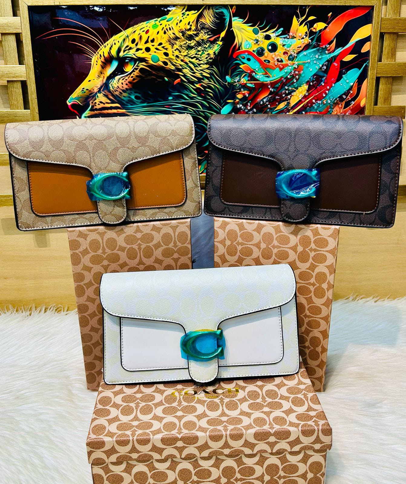 coach tabby clutches